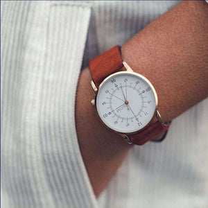 montre aiguille marron femme et homme | Pelote De Porcelaine